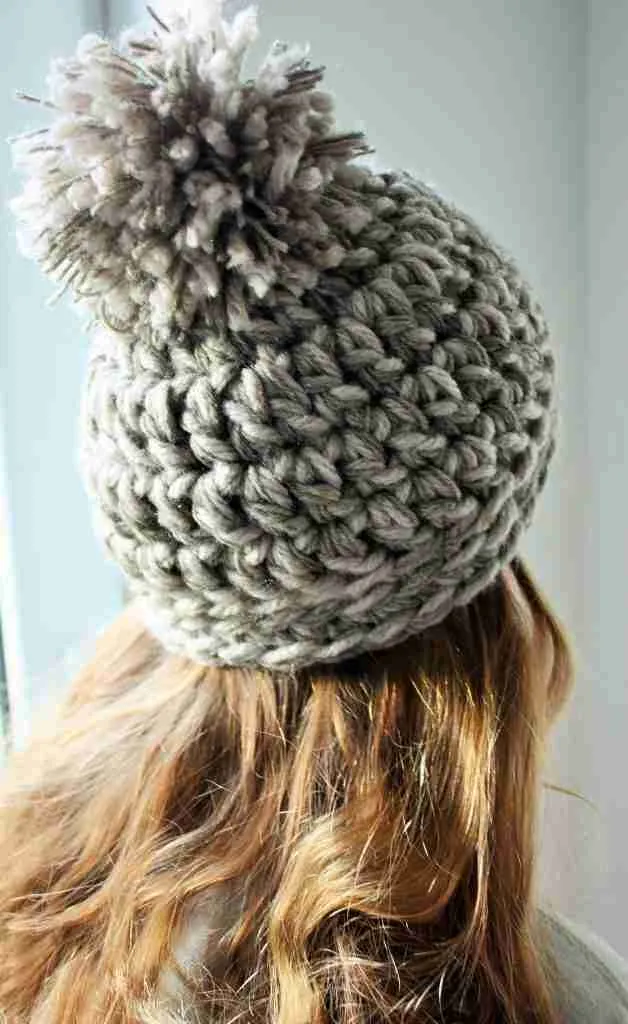 girl in chunky knit hat